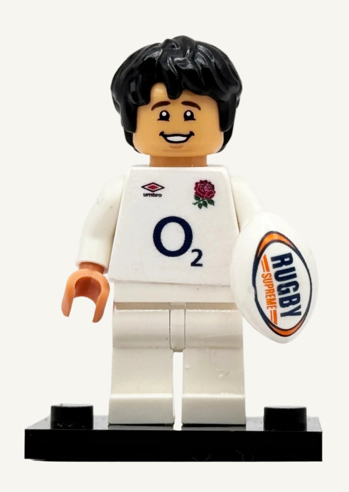 Custom LEGO England rugby minifigure in white Six Nations kit with a rugby ball