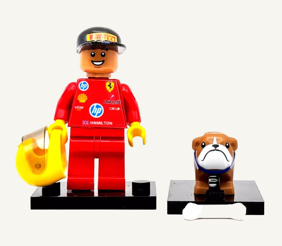 Custom LEGO minifigures of Lewis Hamilton in Ferrari race kit and his bulldog Roscoe